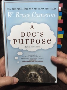 Mama holding A Dog's Purpose