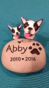 Abby's memorial stone and tiny sculptures